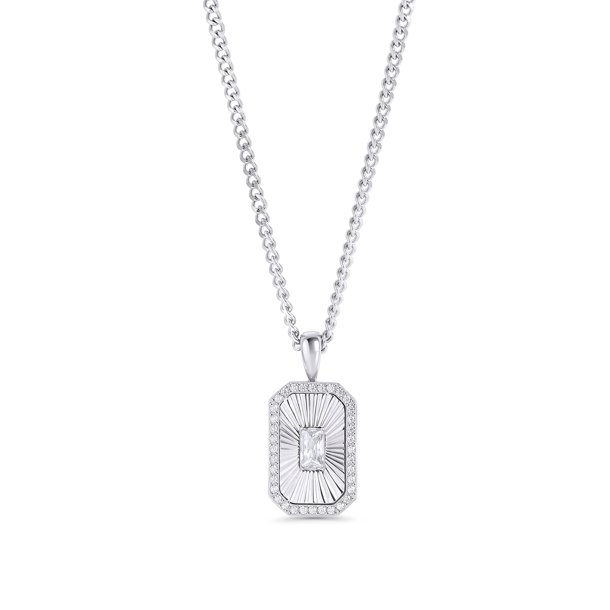 A silver chain necklace with a rectangular octagonal pendant featuring a fluted sunburst center, a baguette-cut clear stone and a pavé stone halo. Waterproof, stainless steel and allergy free. By MIAJWL.
Collier à chaîne argentée avec pendentif rectangulaire octogonal à motif rayonnant strié, serti d'une pierre transparente taille baguette et d'un halo de pierres pavées. Résistant à l'eau, en acier inoxydable et hypoallergénique. Par MIAJWL.