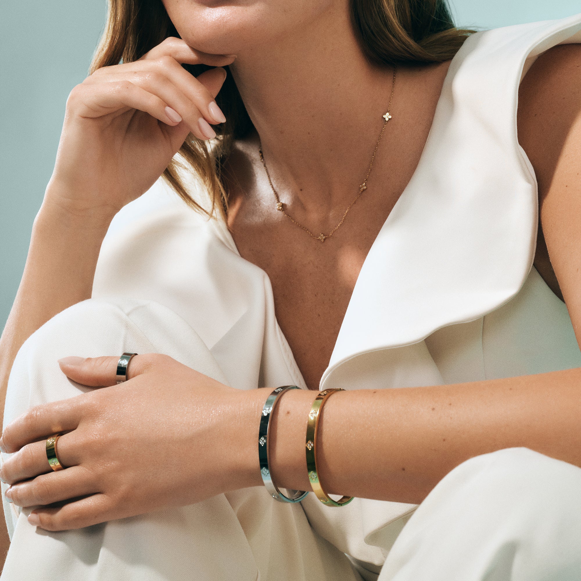Gold and silver stainless steel bangle bracelets and matching rings, hypoallergenic jewelry for sensitive skin, tarnish free and waterproof, affordable luxury jewelry in Canada and Toronto.