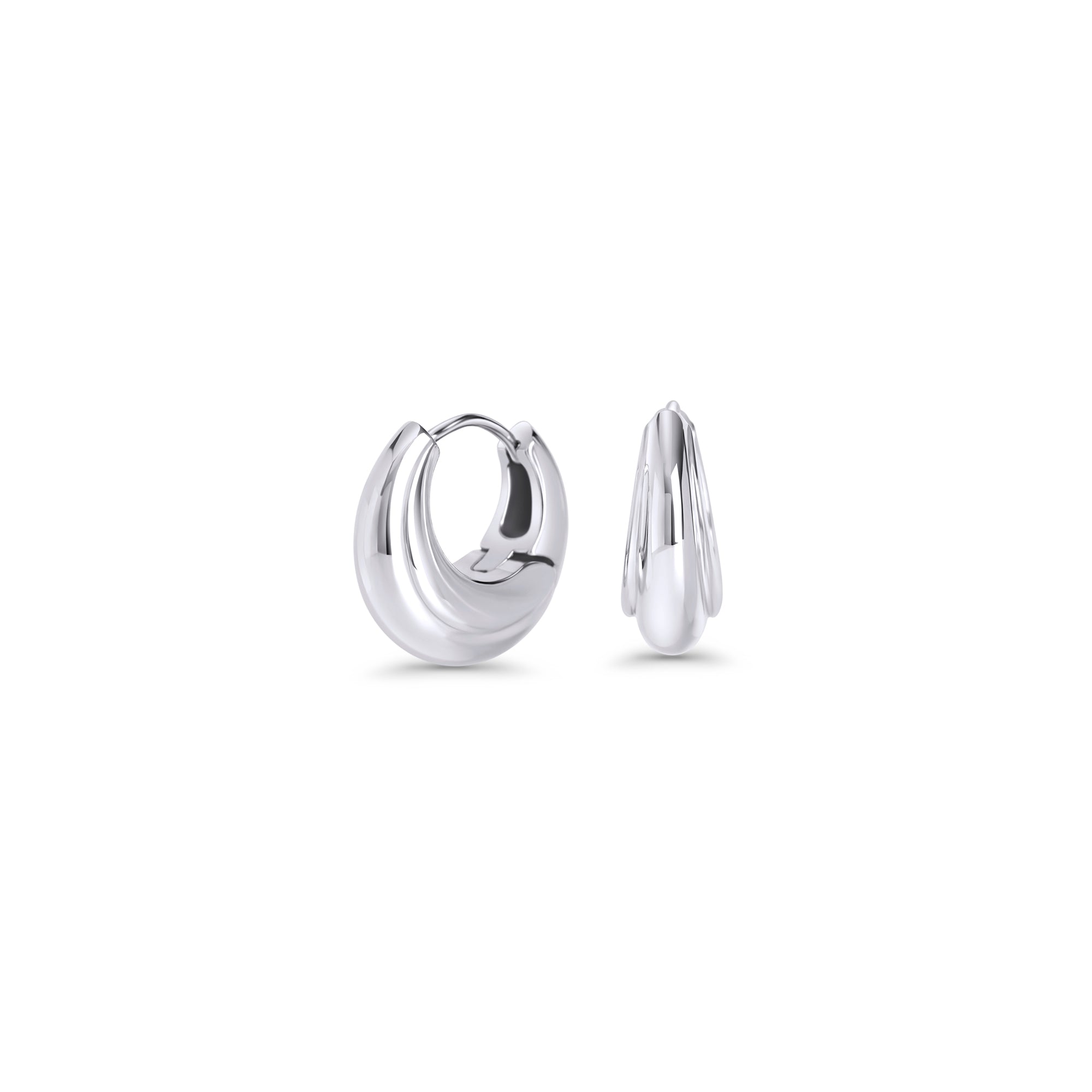 Polished silver chunky hoop earrings with a smooth domed design on a white background. Nickel-free, waterproof & tarnish-resistant stainless steel earrings for sensitive skin, minimalist luxury jewelry by Mia Bijoux Canada.
Boucles d'oreilles anneaux argentées larges au design dôme lisse sur fond blanc. Boucles d'oreilles en acier inoxydable sans nickel, résistantes à l'eau et anti-ternissement pour peaux sensibles, bijouterie de luxe minimaliste par Mia Bijoux Canada.
