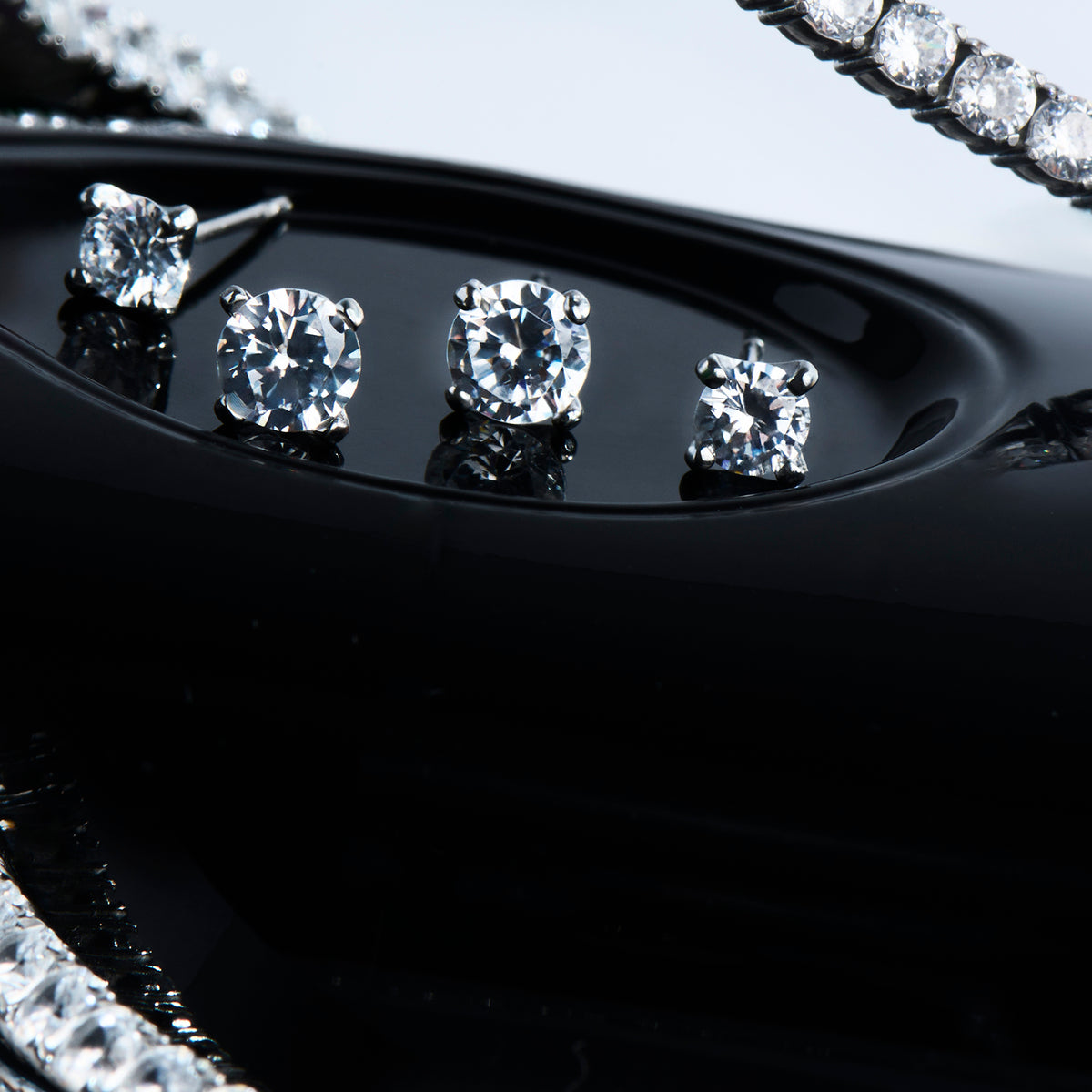 Stainless 4mm round cz stud earrings