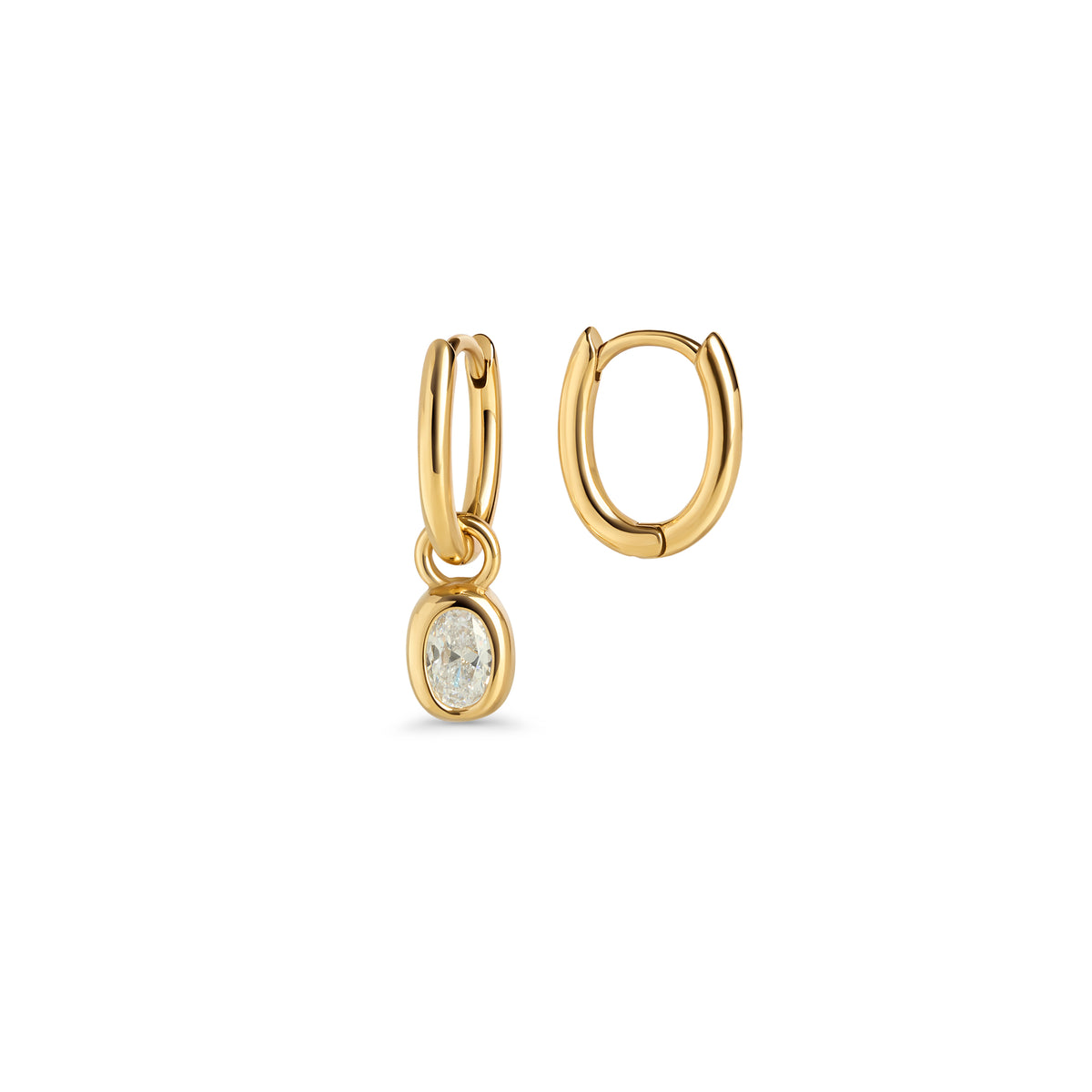 Gold hoop earrings with an oval clear stone pendant on a white background. 2-in-1. Waterproof jewelry by Mia Bijoux Canada.

Boucles d'oreilles anneaux dorées avec pendentif serti d'une pierre transparente ovale sur fond blanc. 2 en 1. Bijoux résistants à l'eau par Mia Bijoux Canada.