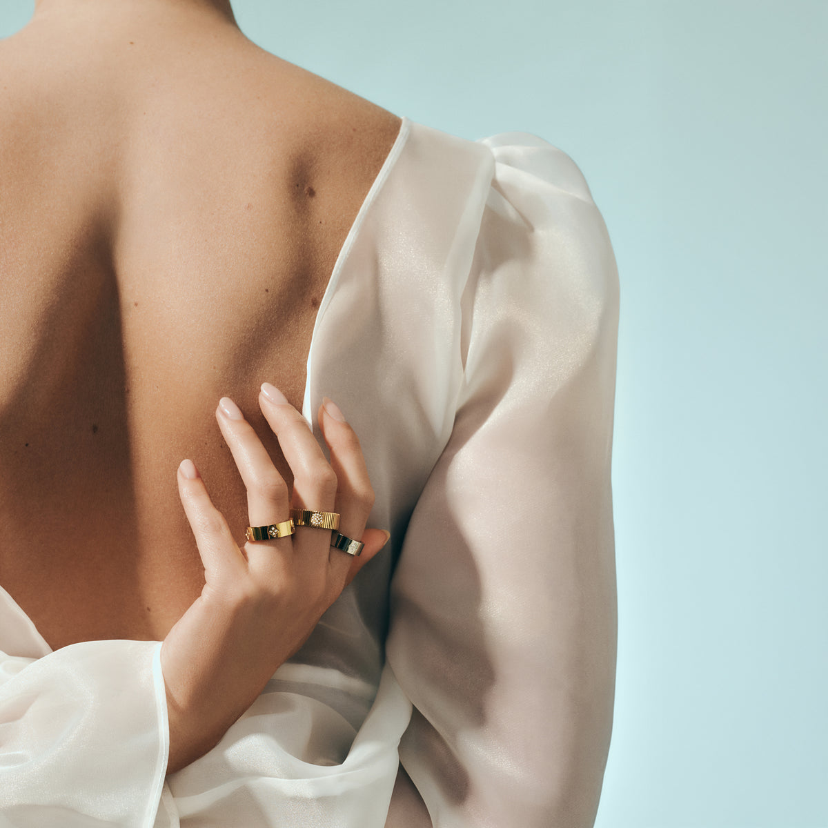 Gold ribbed band ring with round pavé detail in surgical stainless steel, hypoallergenic jewelry for sensitive skin, tarnish free and safe.