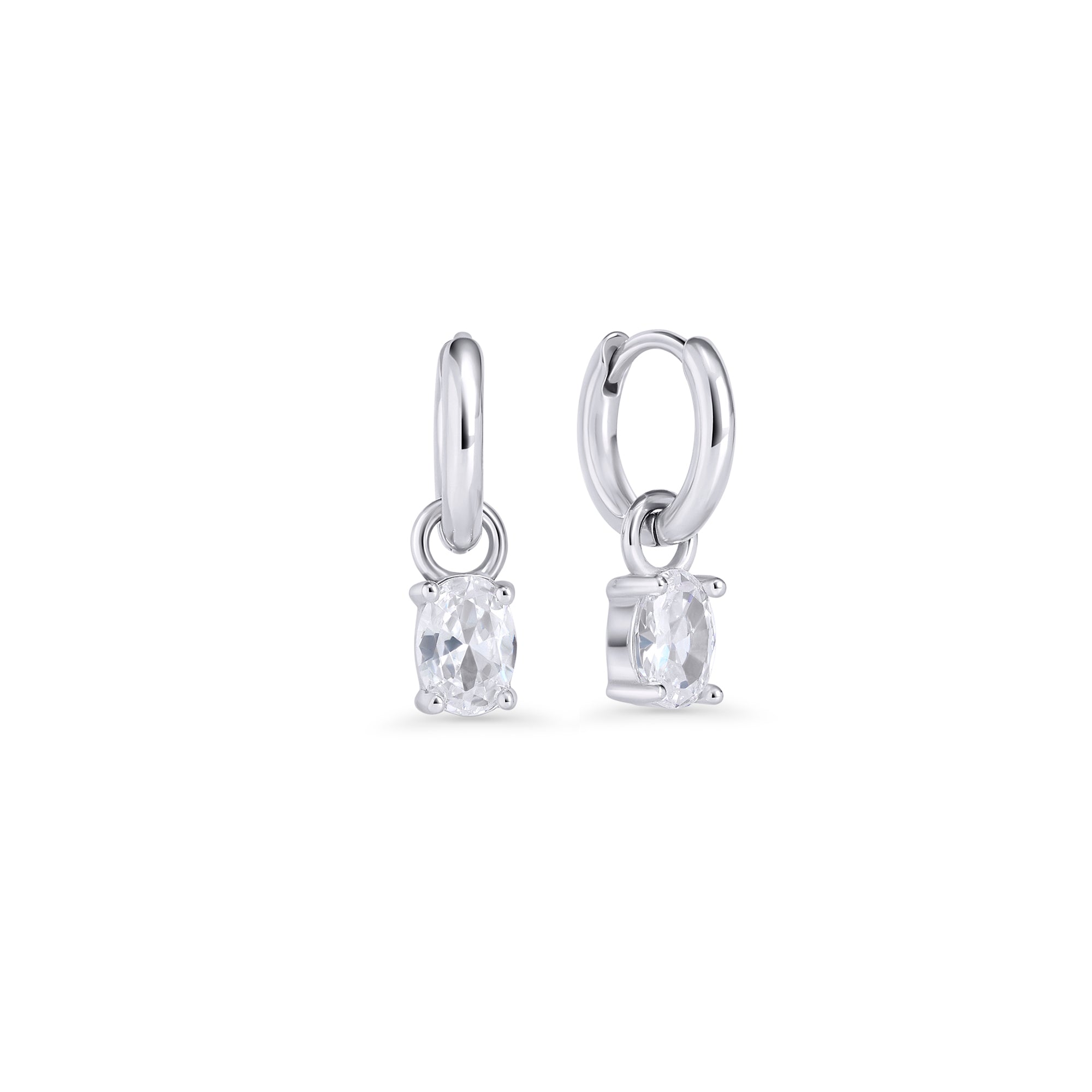 Silver hoop earrings with an oval clear stone pendant in a prong setting on a white background. Jewelry by Mia Bijoux Canada.

Boucles d'oreilles anneaux argentées avec pendentif serti sur griffes d'une pierre transparente ovale sur fond blanc. Bijoux par Mia Bijoux Canada.