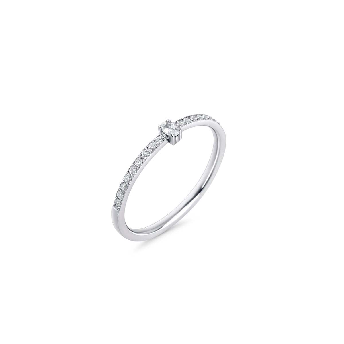 Silver stainless steel pavé ring with round cubic zirconia center stone, delicate minimalist band, hypoallergenic non-tarnish durable jewelry, elegant modern stacking ring for everyday wear.

